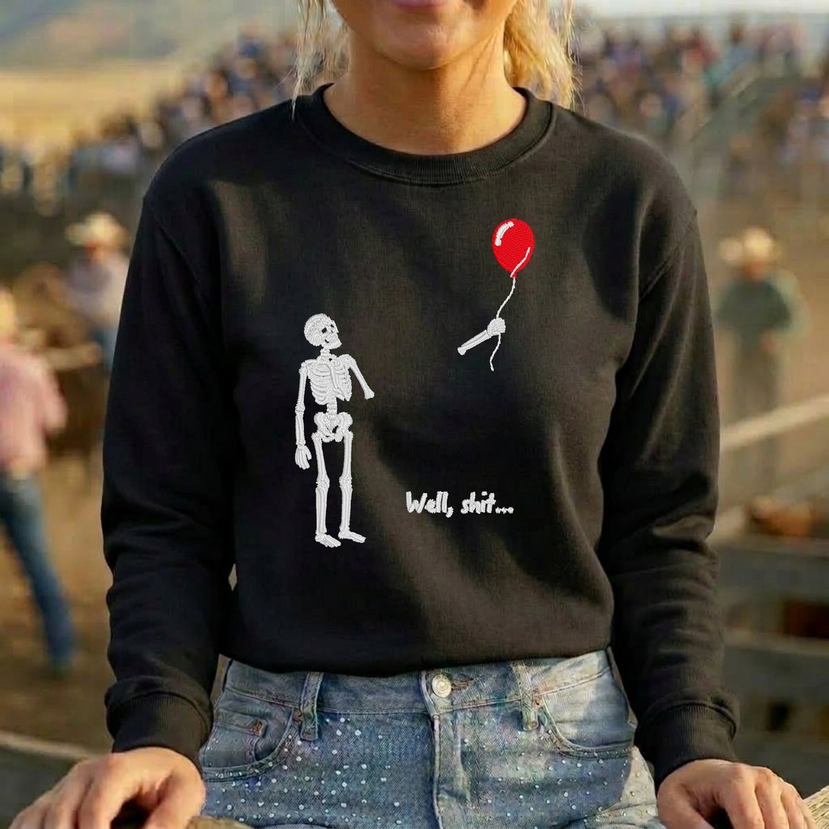 funny-skeleton-balloon-embroidered-black-gildan-sweatshirt-flat-lay