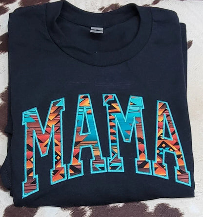 Folded black MAMA Aztec appliqué crewneck sweatshirt showing embroidered western design