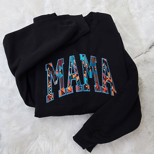 Black Gildan Heavy Blend sweatshirt with colorful Western geometric MAMA embroidery on white fur