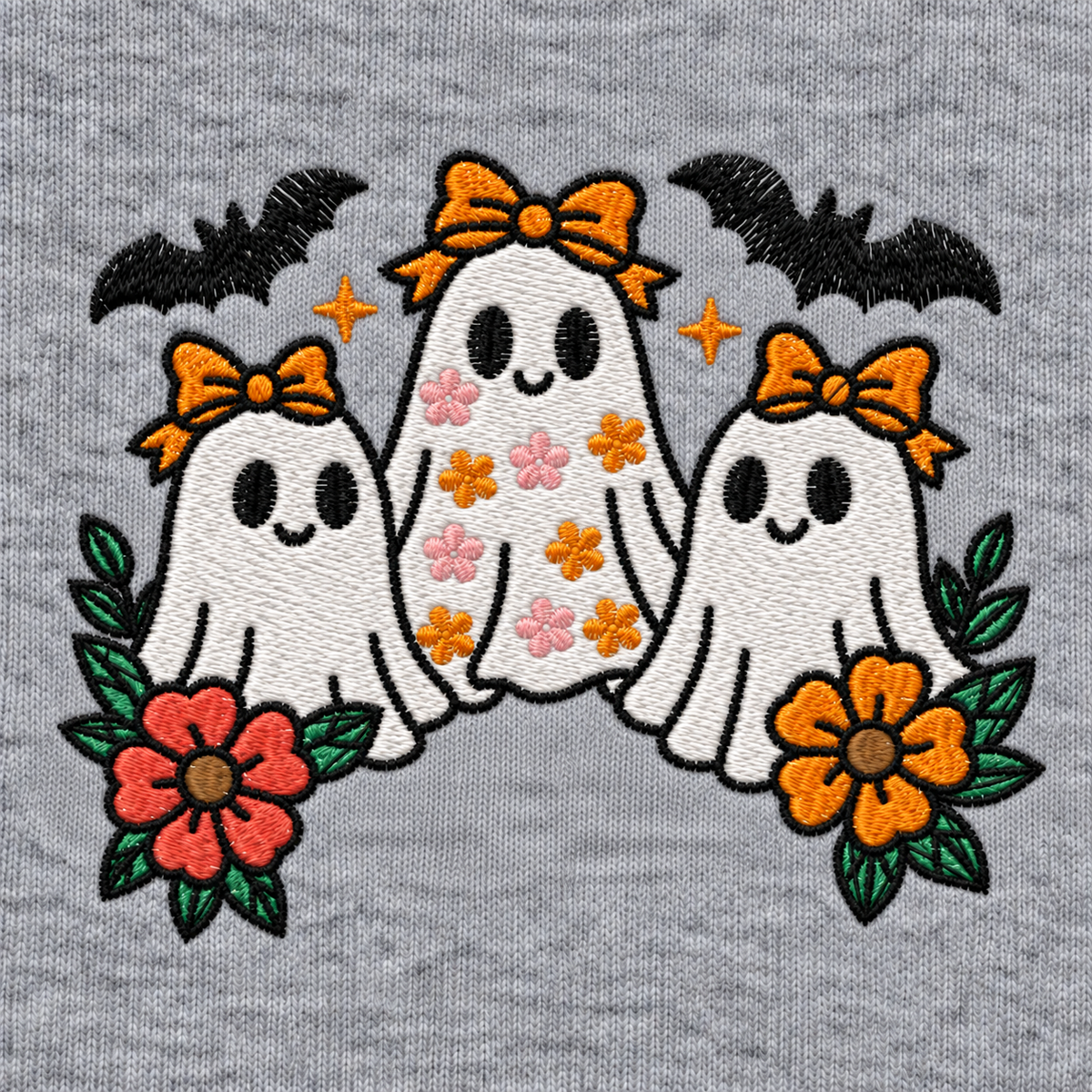 Close-up of white ghost trio embroidery with bows bats flowers and green leaves on Sport Grey