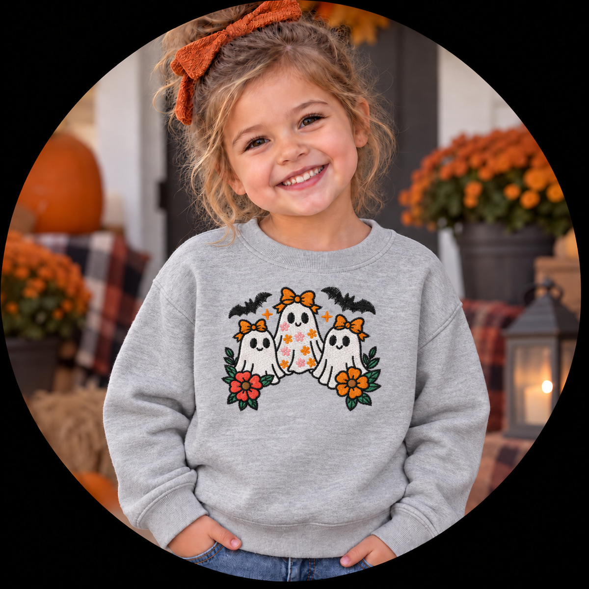 Toddler girl wearing Sport Grey embroidered white ghost trio sweatshirt