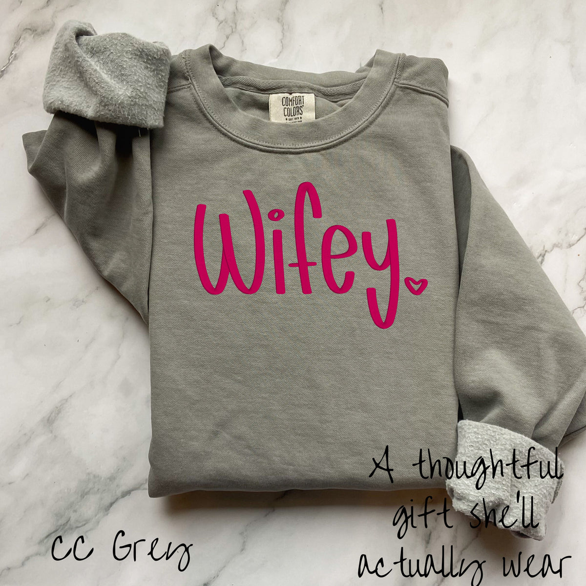 Gray Comfort Colors crewneck embroidered with a bright pink Wifey design
