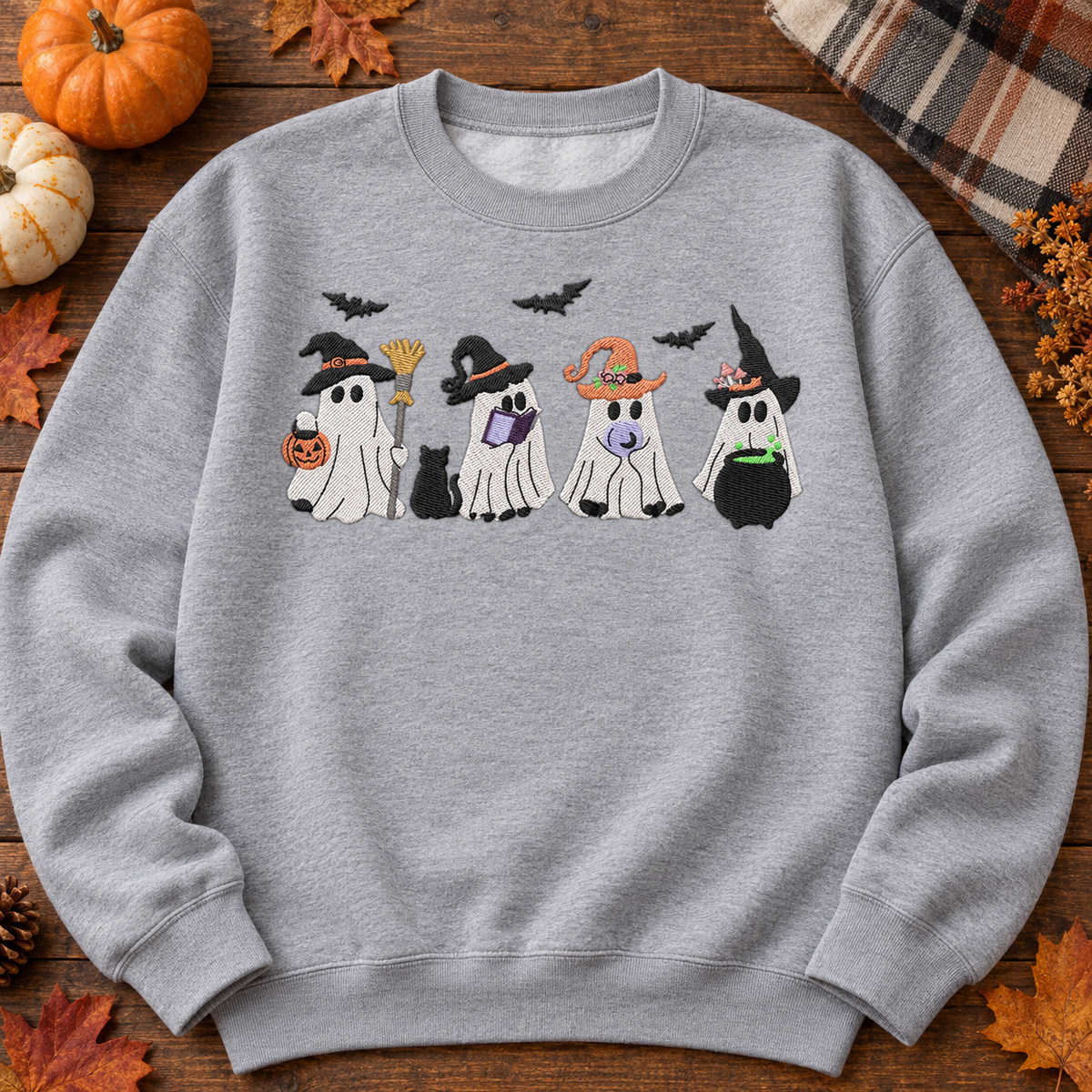 Sport Grey four witchy ghosts embroidered sweatshirt flat lay with autumn pumpkins and leaves