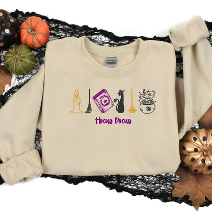 Sand witchy embroidered sweatshirt styled with Halloween pumpkins and black lace