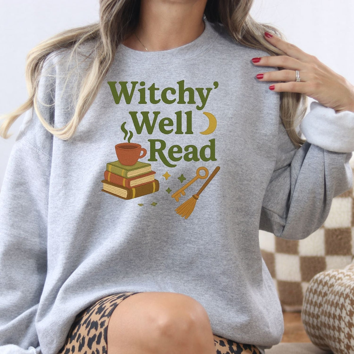 Ash Witchy Well Read embroidered sweatshirt for book lovers, lifestyle view