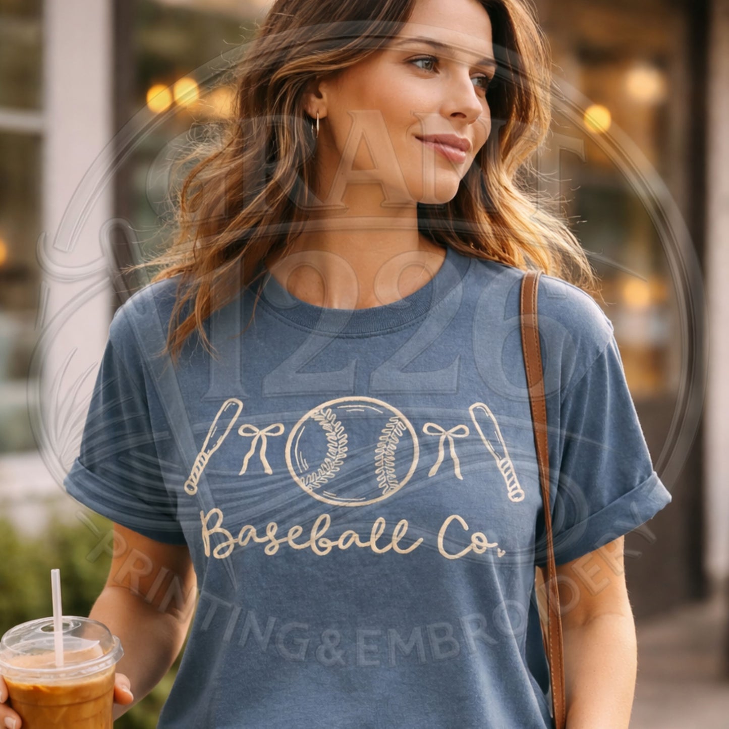 Trendy womens baseball outfit featuring embroidered sports tee