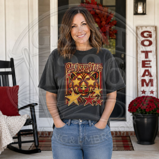 Woman wearing charcoal Labette County Grizzlies Comfort Colors game day T-shirt